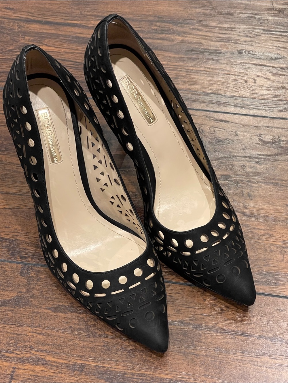 BCBGMaxAzria Black Laser-Cut Pointed Pumps with Geometric Cutouts